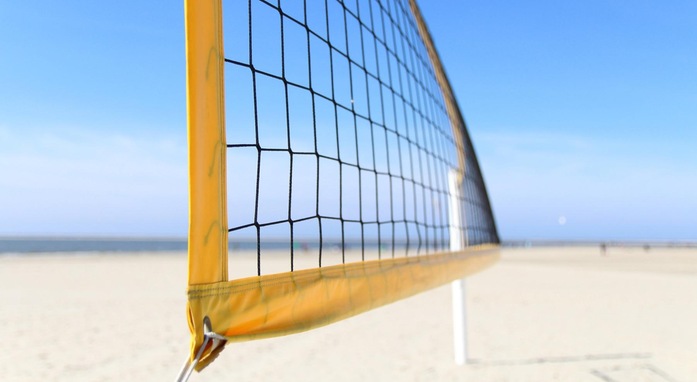 Beach with volleyball net